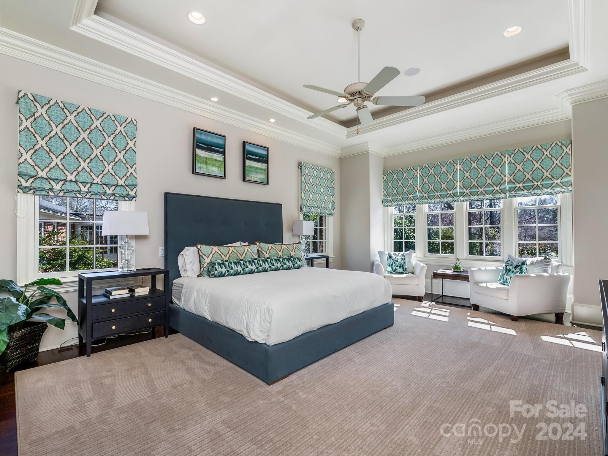 1271 Andover Road Charlotte, NC 28211 - Photo 18 of 40 a spacious bedroom with a large bed and a large window