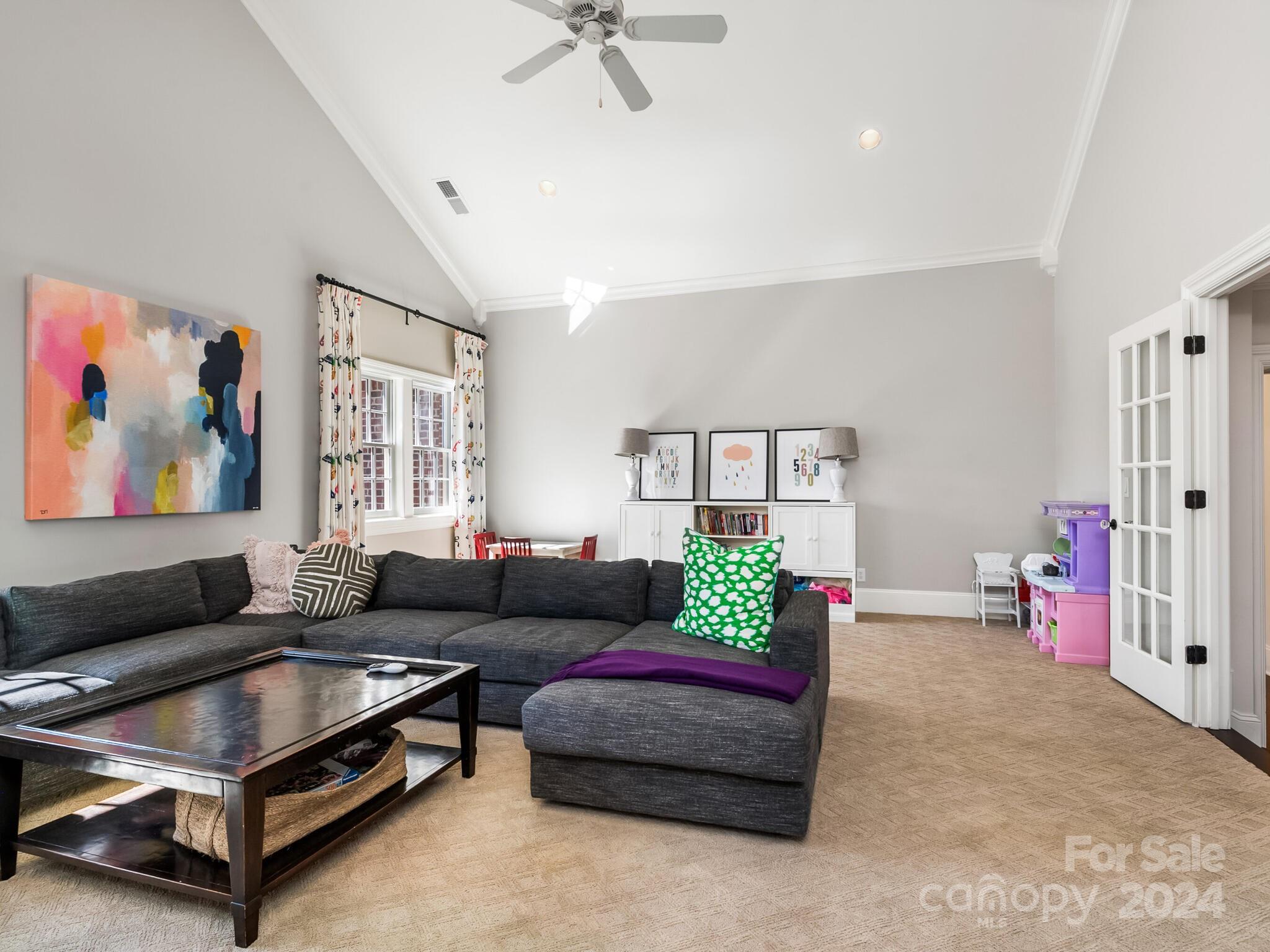 1271 Andover Road Charlotte, NC 28211 - Photo 25 of 40 a living room with furniture and a flat screen tv
