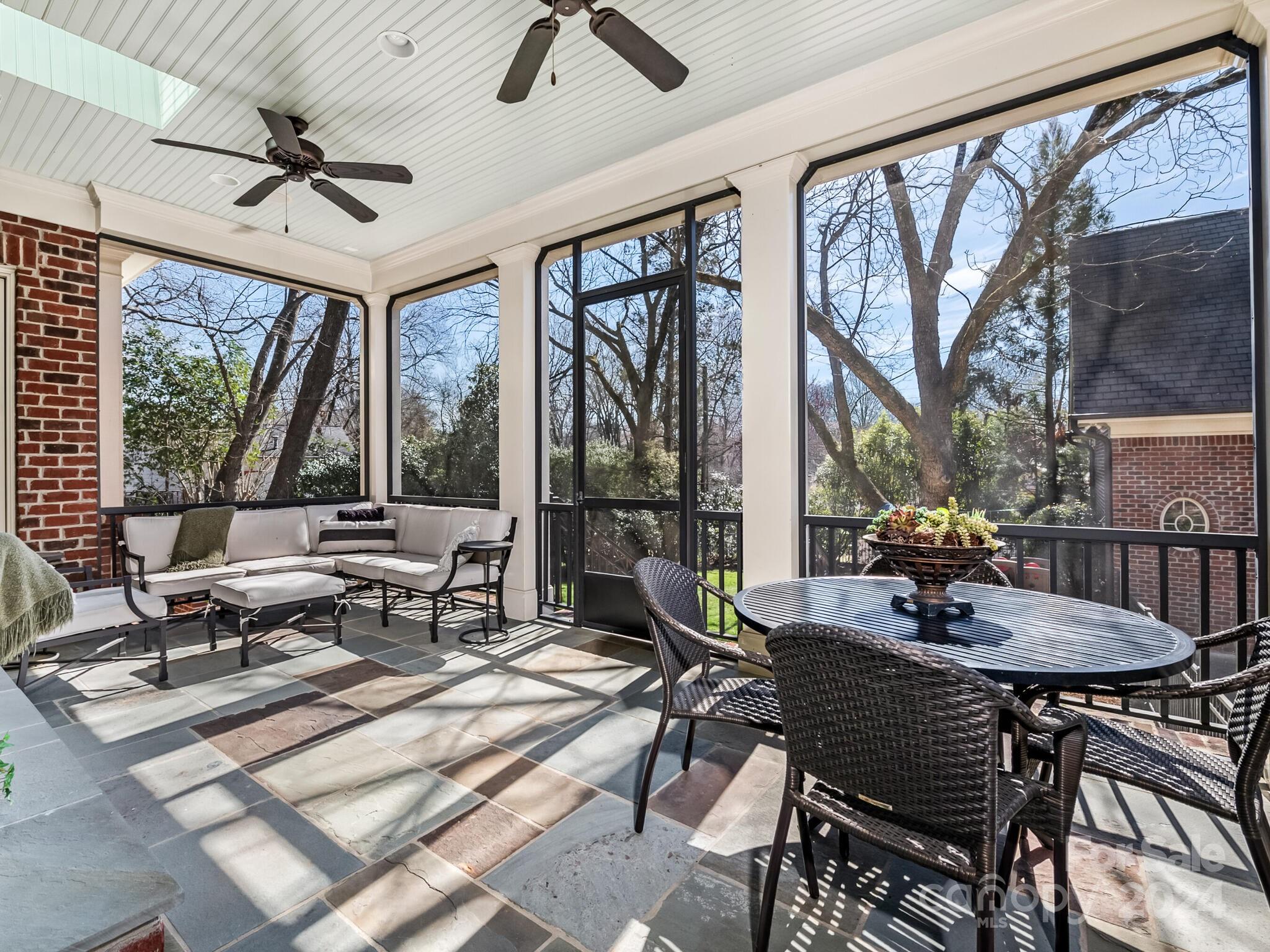 1271 Andover Road Charlotte, NC 28211 - Photo 33 of 40 a living room with furniture and a large window