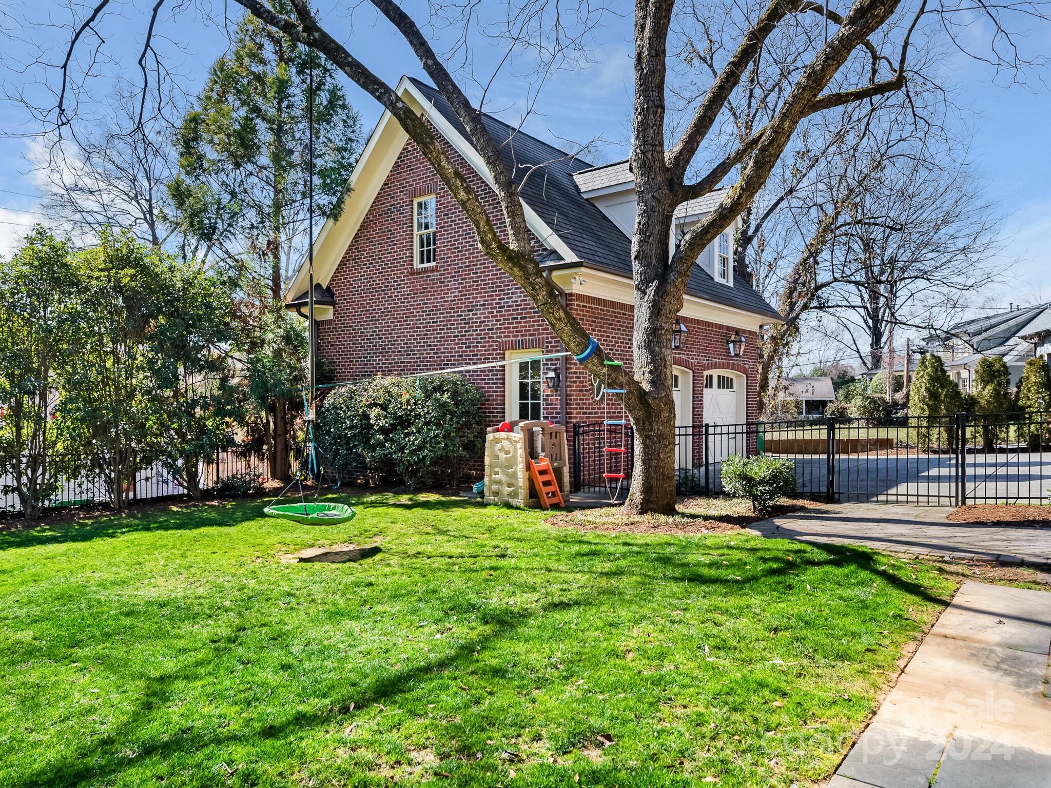 1271 Andover Road Charlotte, NC 28211 - Photo 36 of 40 a view of a house with a yard and sitting area