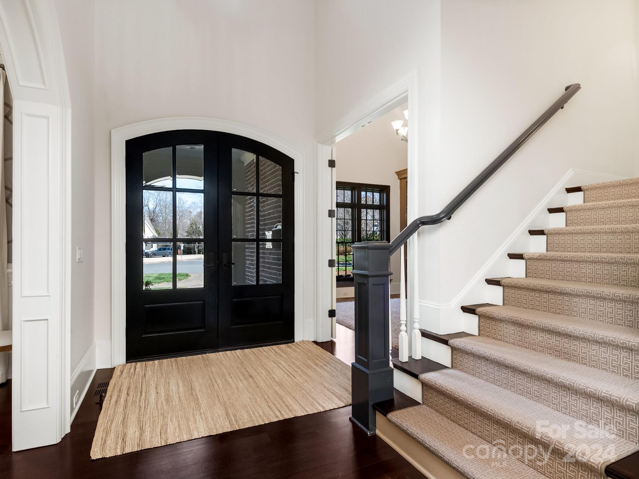 1271 Andover Road Charlotte, NC 28211 - Photo 5 of 40 a view of entryway with wooden floor and a front door