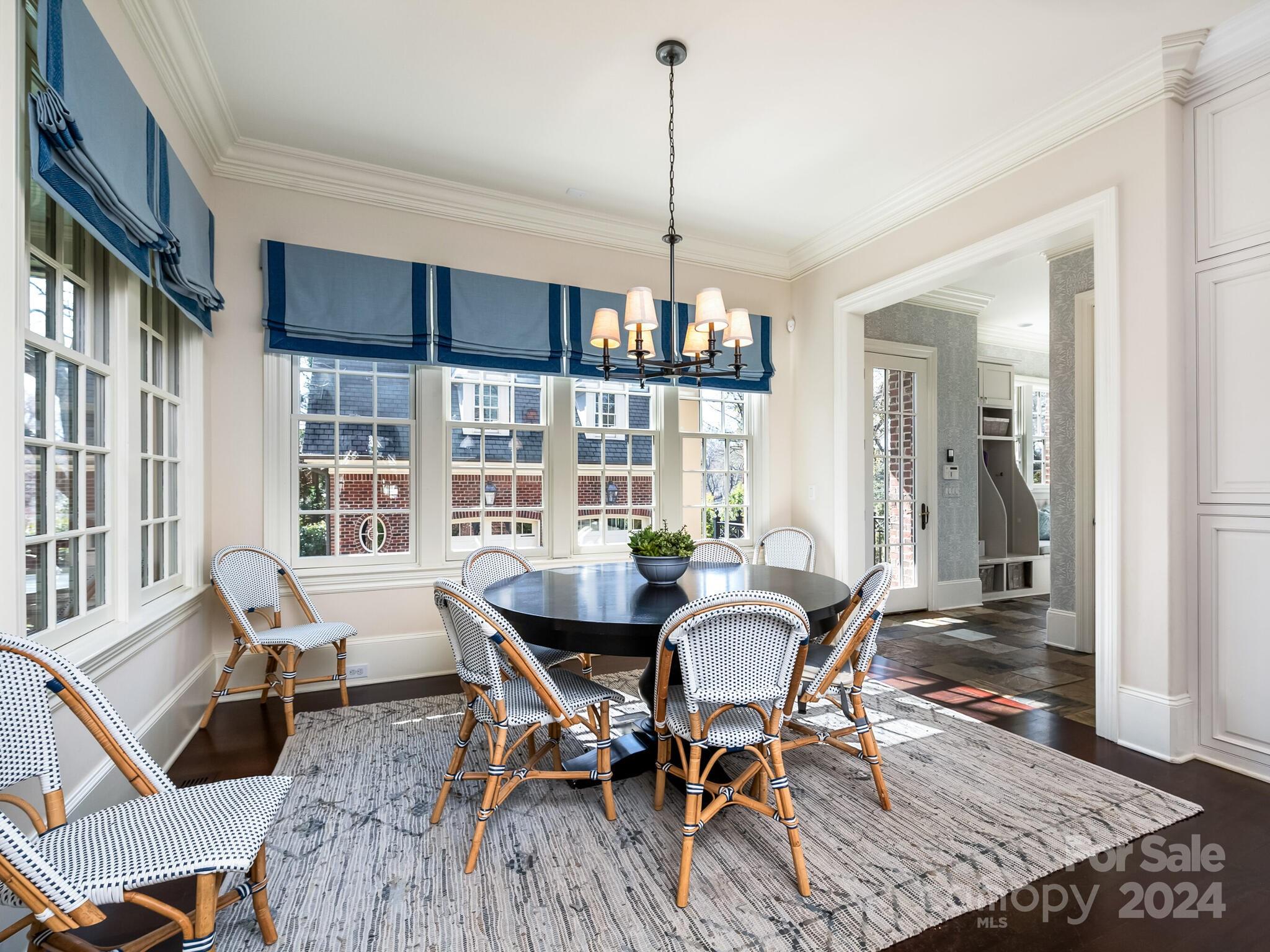 1271 Andover Road Charlotte, NC 28211 - Photo 10 of 40 a view of a dining room with furniture window and wooden floor