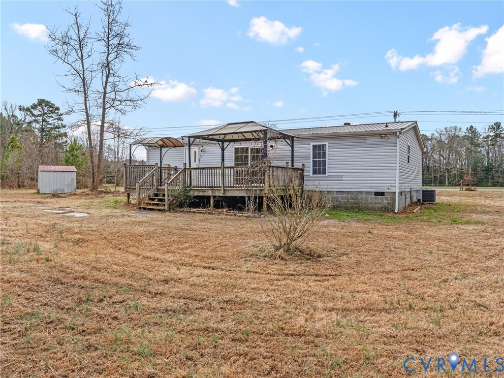4772 Carsley Road Waverly, VA 23890 - Photo 33 of 38 a view of a house with a yard