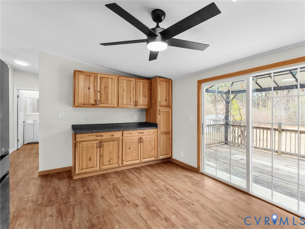 4772 Carsley Road Waverly, VA 23890 - Photo 10 of 38 a view of an empty room with window and wooden floor