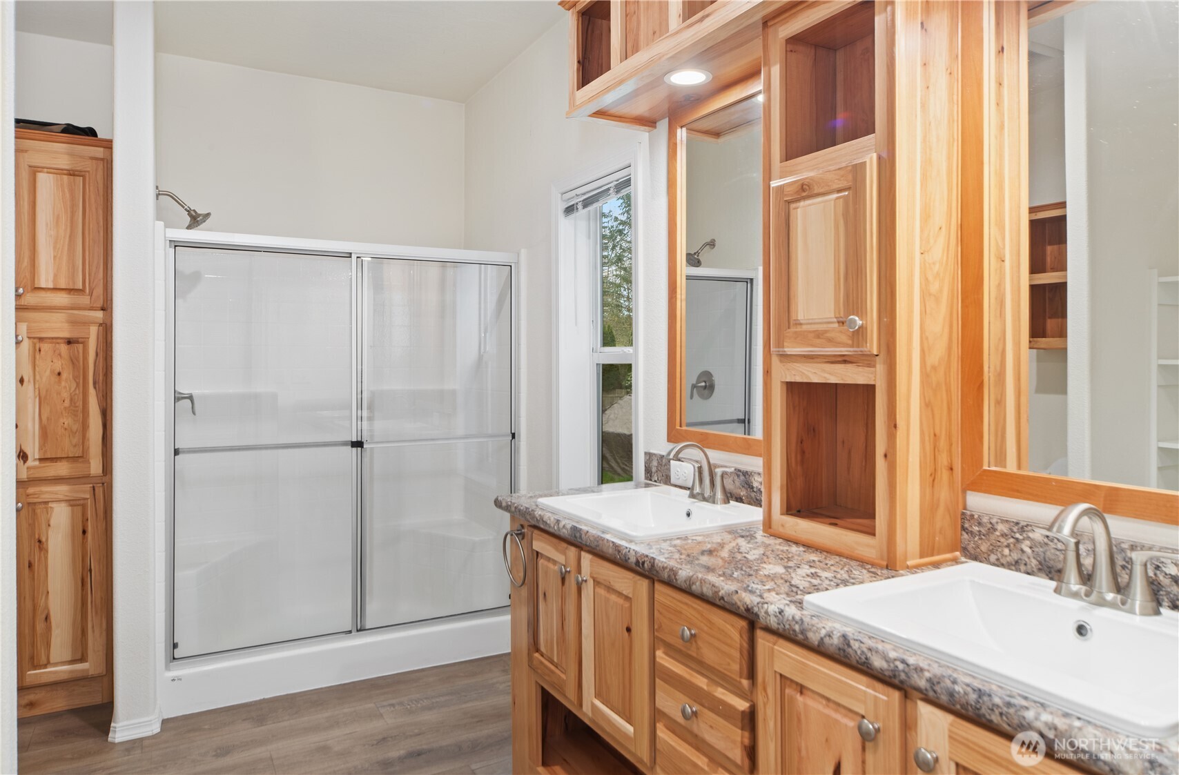 290 Werner Road Port Ludlow, WA 98365 - Photo 18 of 40 a bathroom with a granite countertop sink and a mirror