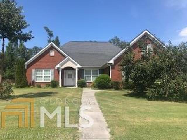 5 Oak View Drive Northeast Rome, GA 30165 - Photo 1 of 1 a front view of a house with garden