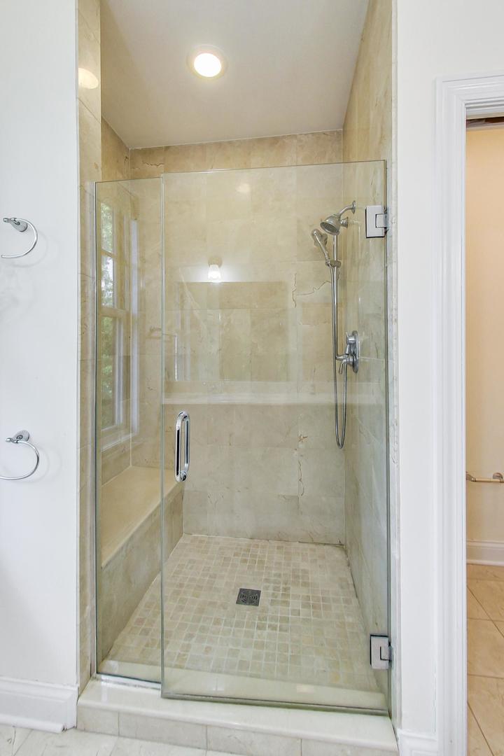 720 Green Bay Road, Unit 2D Winnetka, IL 60093 - Photo 21 of 41 a bathroom with a shower