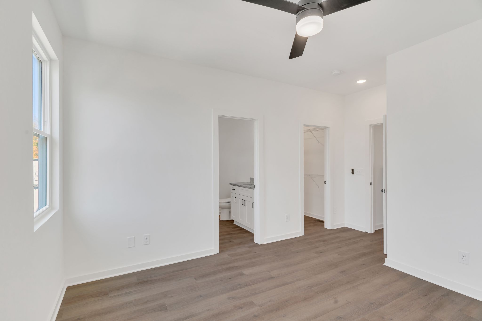308 Cedar Street, Unit 2 Lebanon, TN 37087 - Photo 17 of 28 a view of an empty room with wooden floor