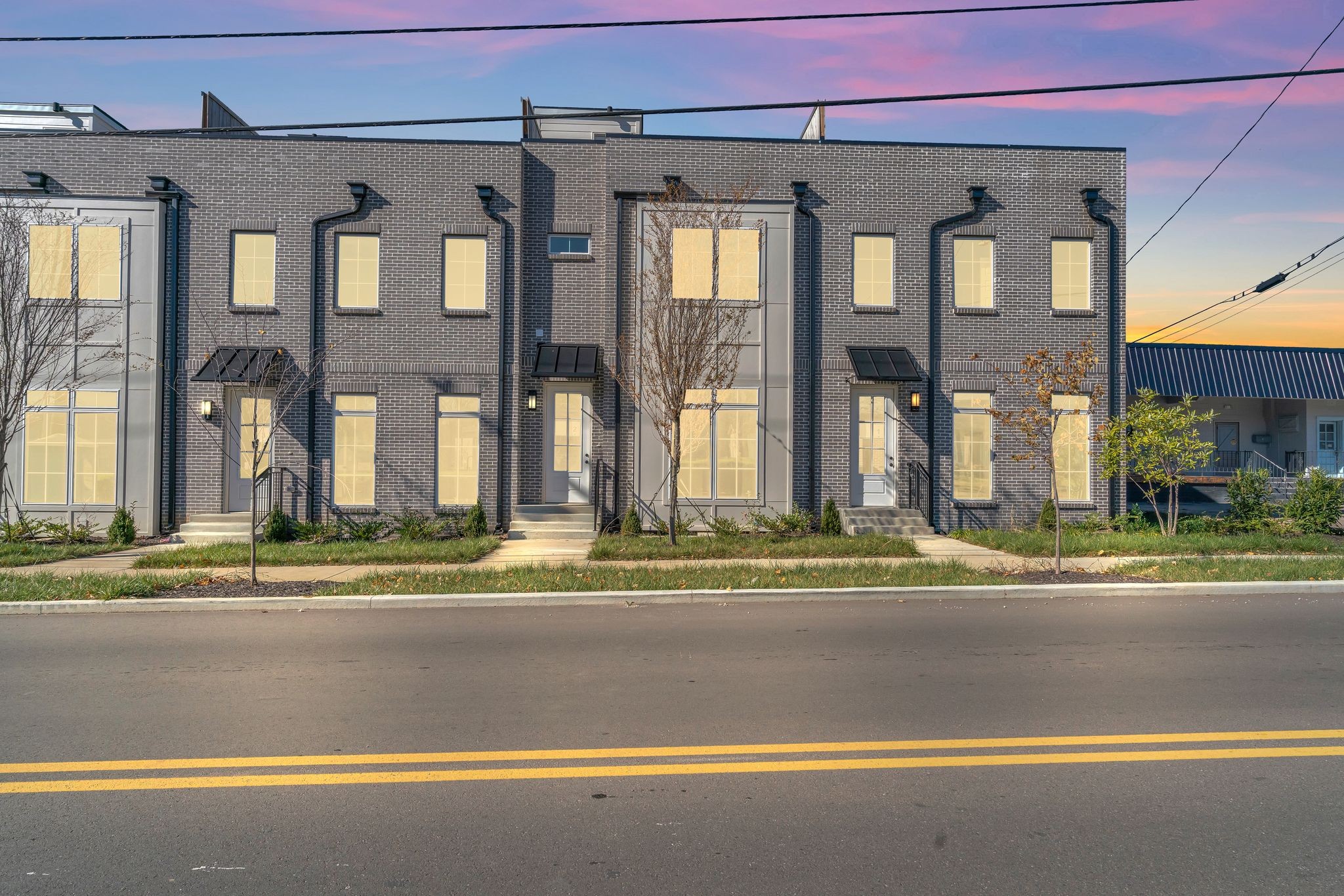 308 Cedar Street, Unit 2 Lebanon, TN 37087 - Photo 2 of 28 a view of a brick building next to a road