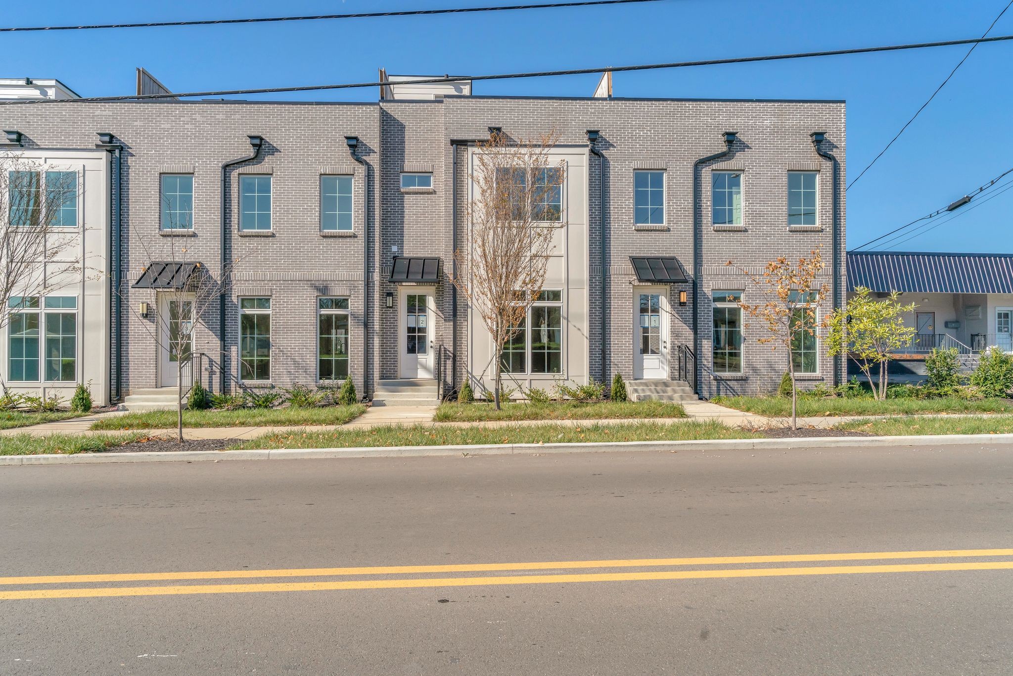 308 Cedar Street, Unit 2 Lebanon, TN 37087 - Photo 3 of 28 a view of a building with a yard