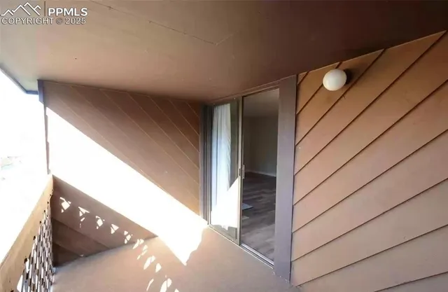 a view of multiple houses with a street