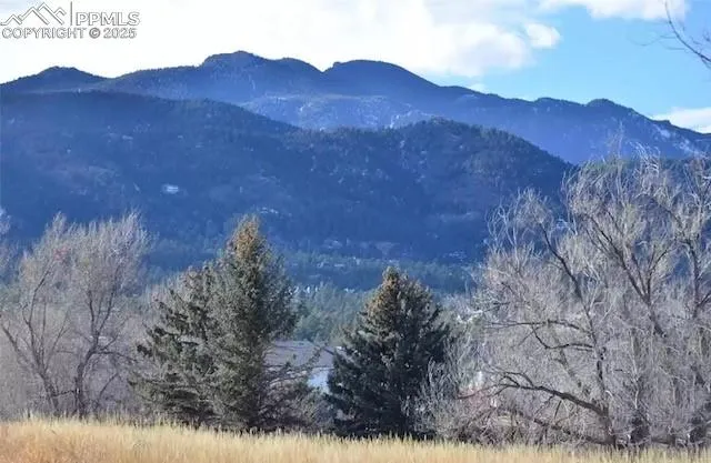 a sign board with a yard