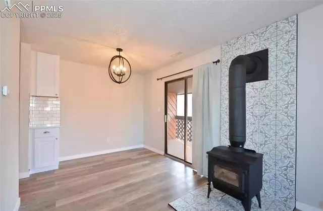 a view of livingroom with furniture and wooden floor