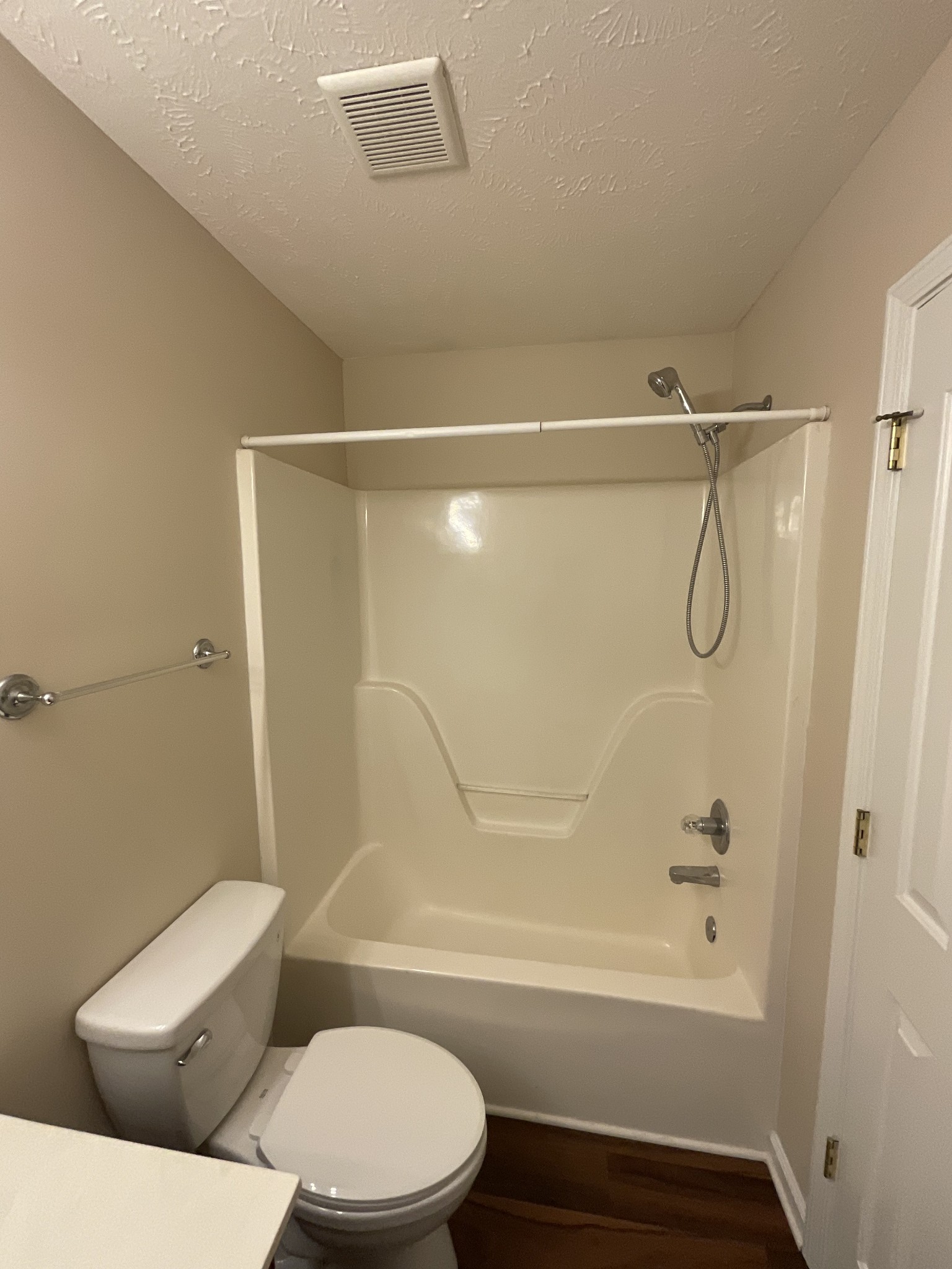 304 Shoshone Place Murfreesboro, TN 37128 - Photo 21 of 29 a bathroom with a toilet and a bath tub