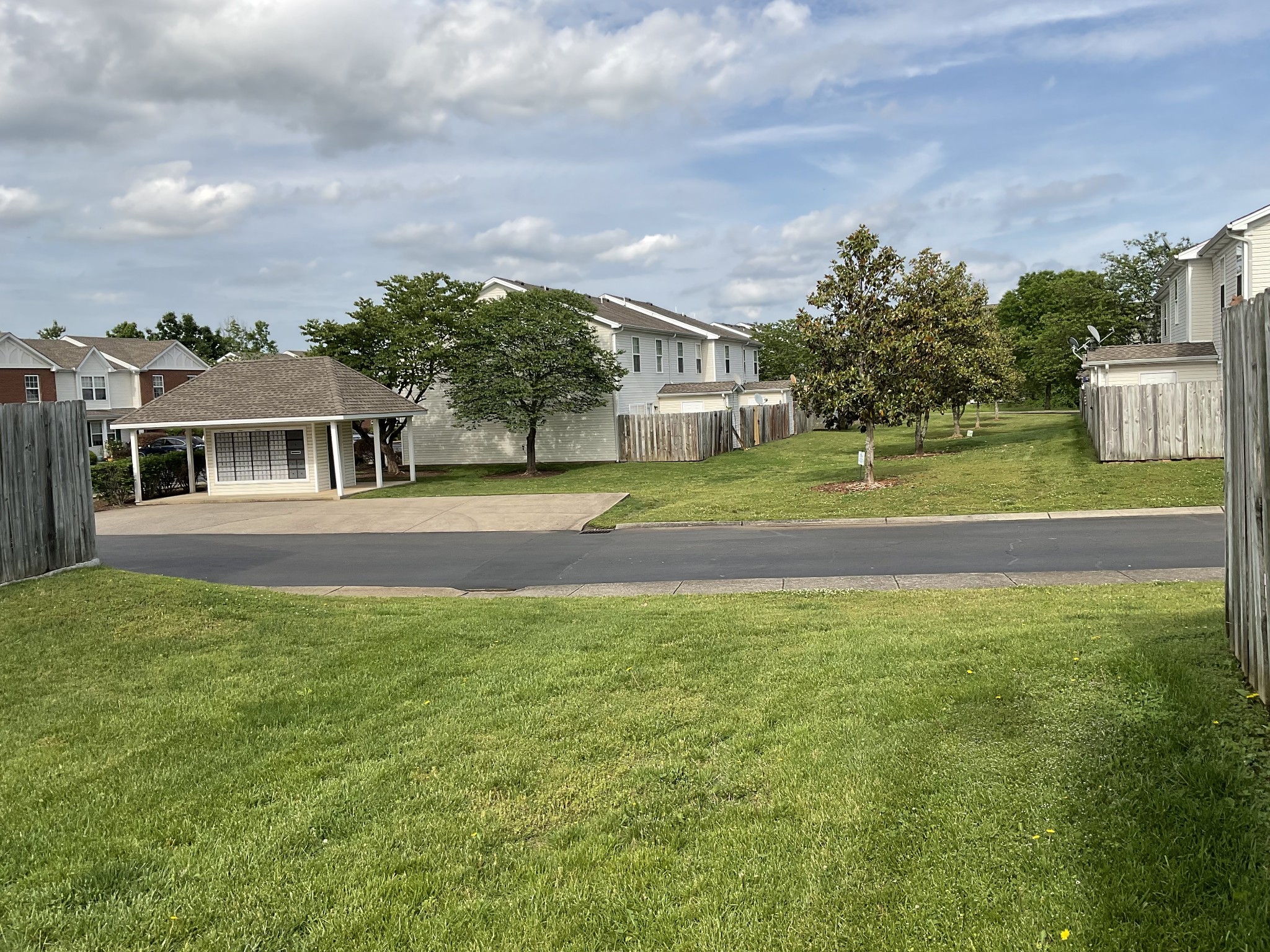 304 Shoshone Place Murfreesboro, TN 37128 - Photo 27 of 29 a view of a house with a big yard and potted plants