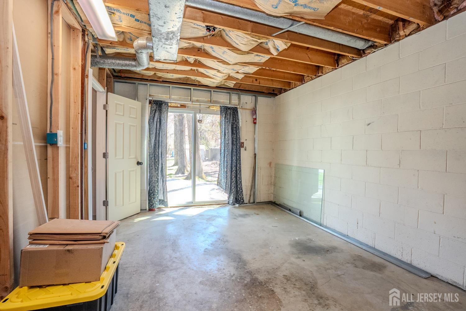 1834 Holly Road North Brunswick, NJ 08902 - Photo 19 of 26 a view of a room with a wooden door