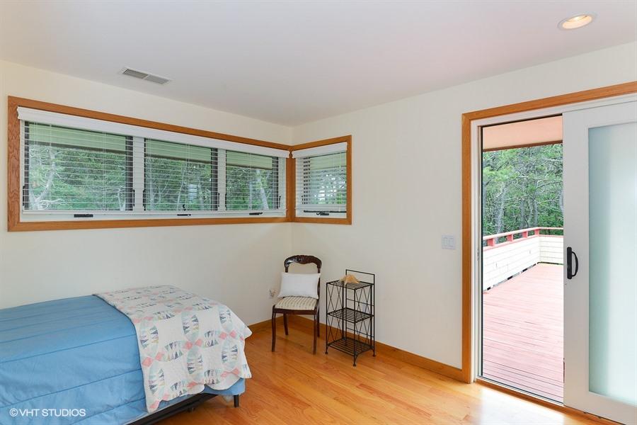 5 Parker Drive Truro, MA 02666 - Photo 12 of 20 a bedroom with a bed and a window