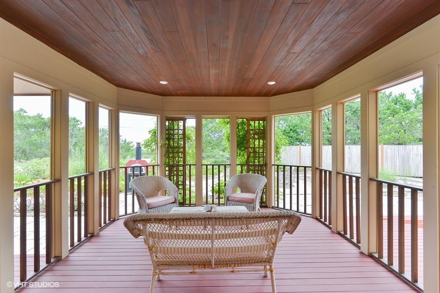 5 Parker Drive Truro, MA 02666 - Photo 13 of 20 a balcony with furniture and wooden floor
