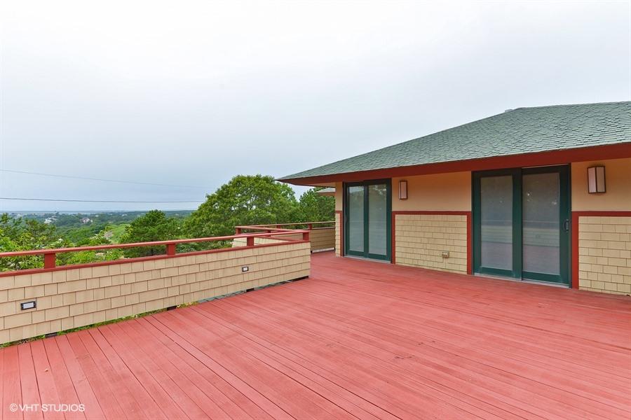 5 Parker Drive Truro, MA 02666 - Photo 16 of 20 a view of a room with wooden floor and fence
