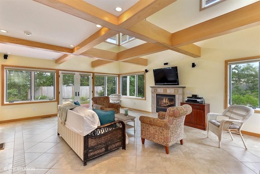 5 Parker Drive Truro, MA 02666 - Photo 3 of 20 a living room with furniture a fireplace and a flat screen tv