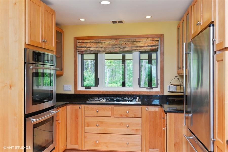 5 Parker Drive Truro, MA 02666 - Photo 5 of 20 a kitchen with stainless steel appliances granite countertop a refrigerator and a stove