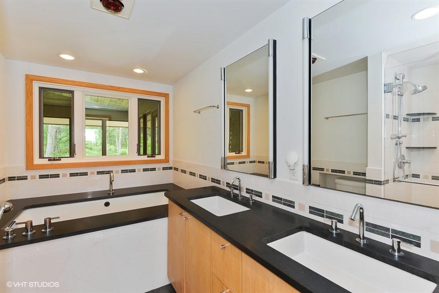 5 Parker Drive Truro, MA 02666 - Photo 9 of 20 a bathroom with a double vanity sink and mirror