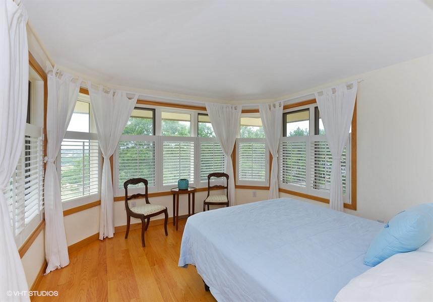 5 Parker Drive Truro, MA 02666 - Photo 10 of 20 a bedroom with furniture and a large window