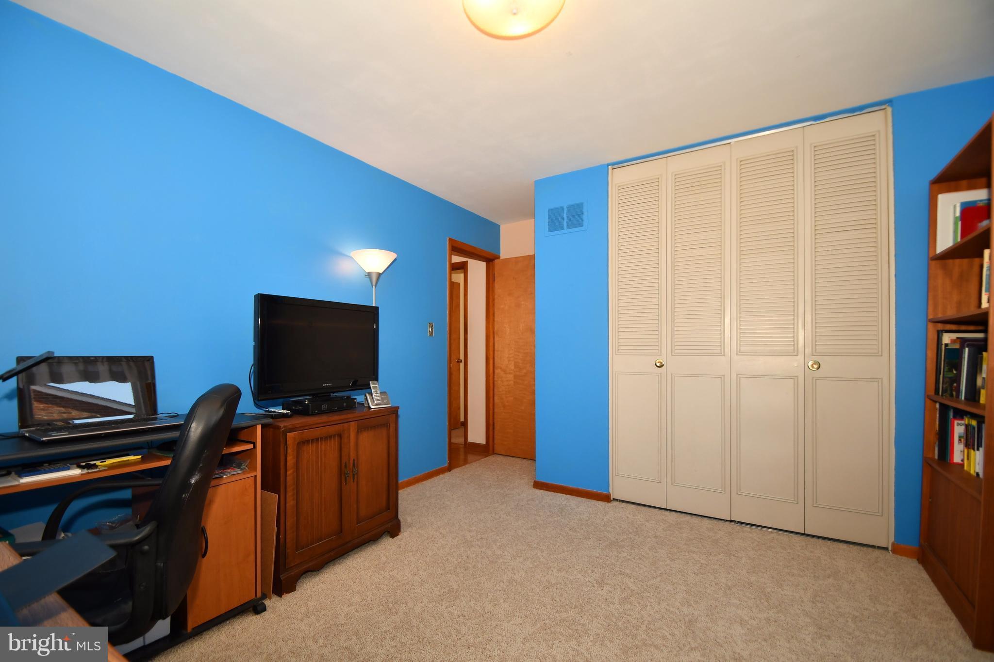 4314 Camellia Road Baltimore, MD 21236 - Photo 16 of 30 a view of a workspace with furniture