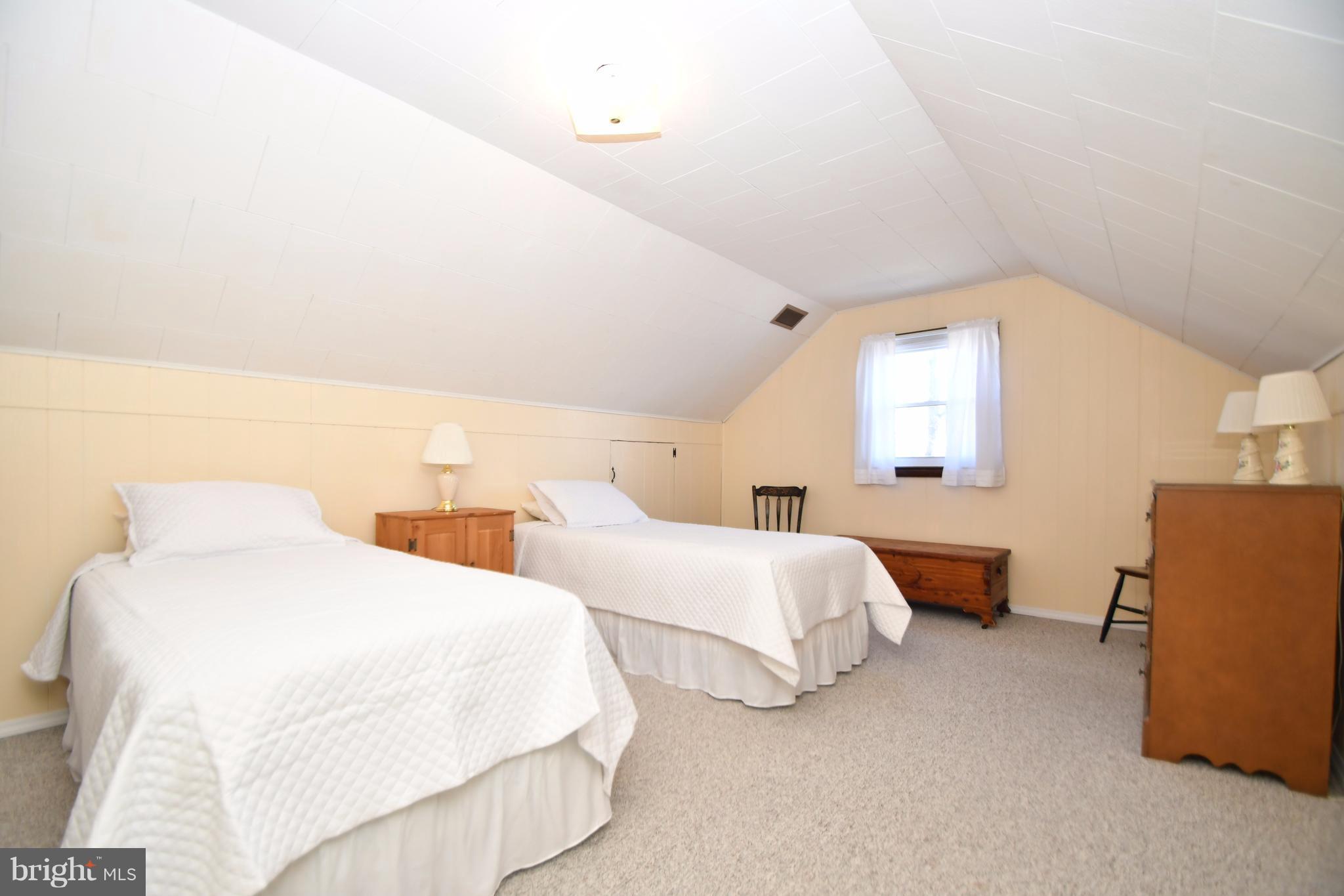 4314 Camellia Road Baltimore, MD 21236 - Photo 18 of 30 a bedroom with two beds and painting on the wall