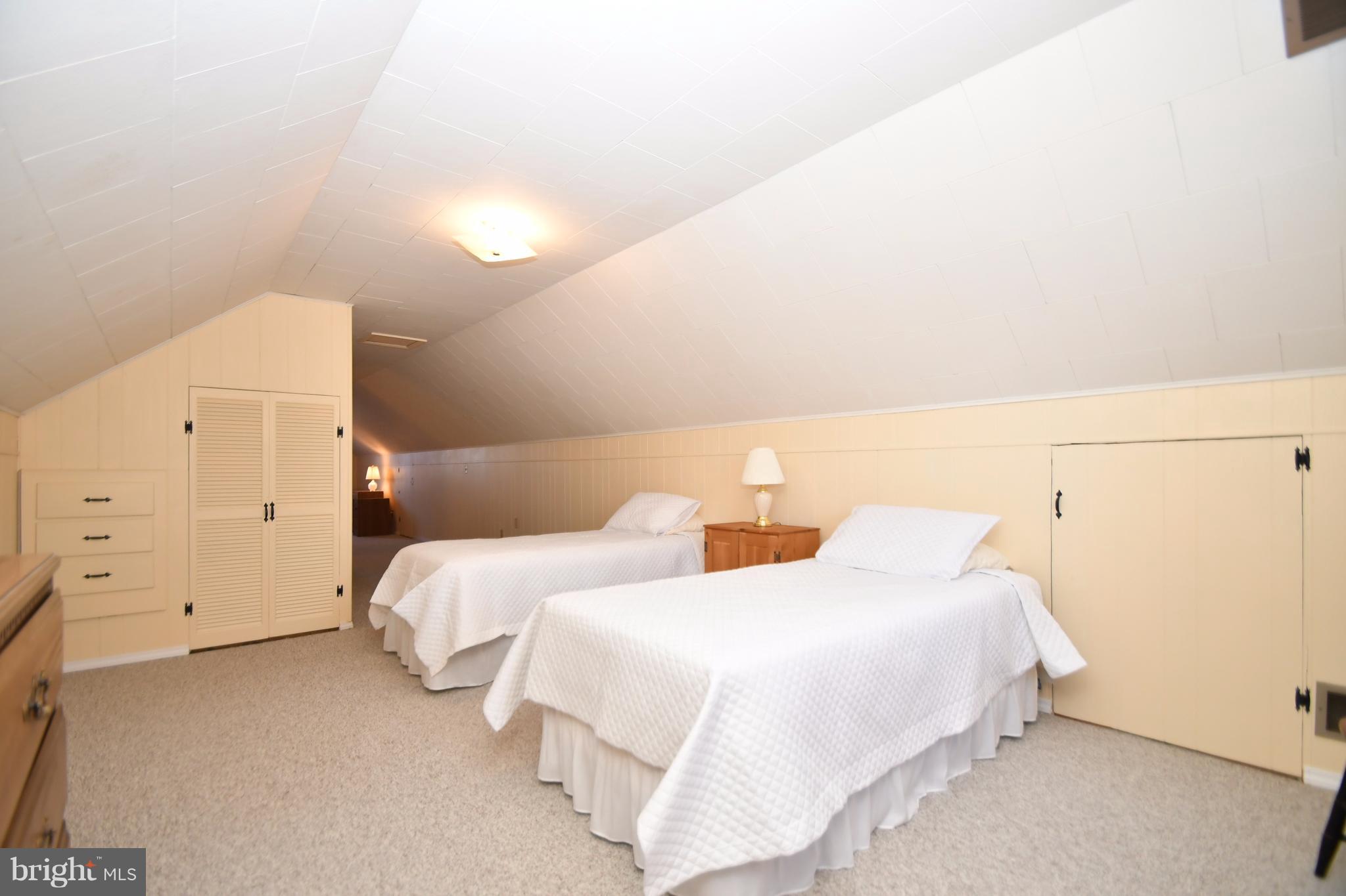 4314 Camellia Road Baltimore, MD 21236 - Photo 19 of 30 a bedroom with two bed and a night stand