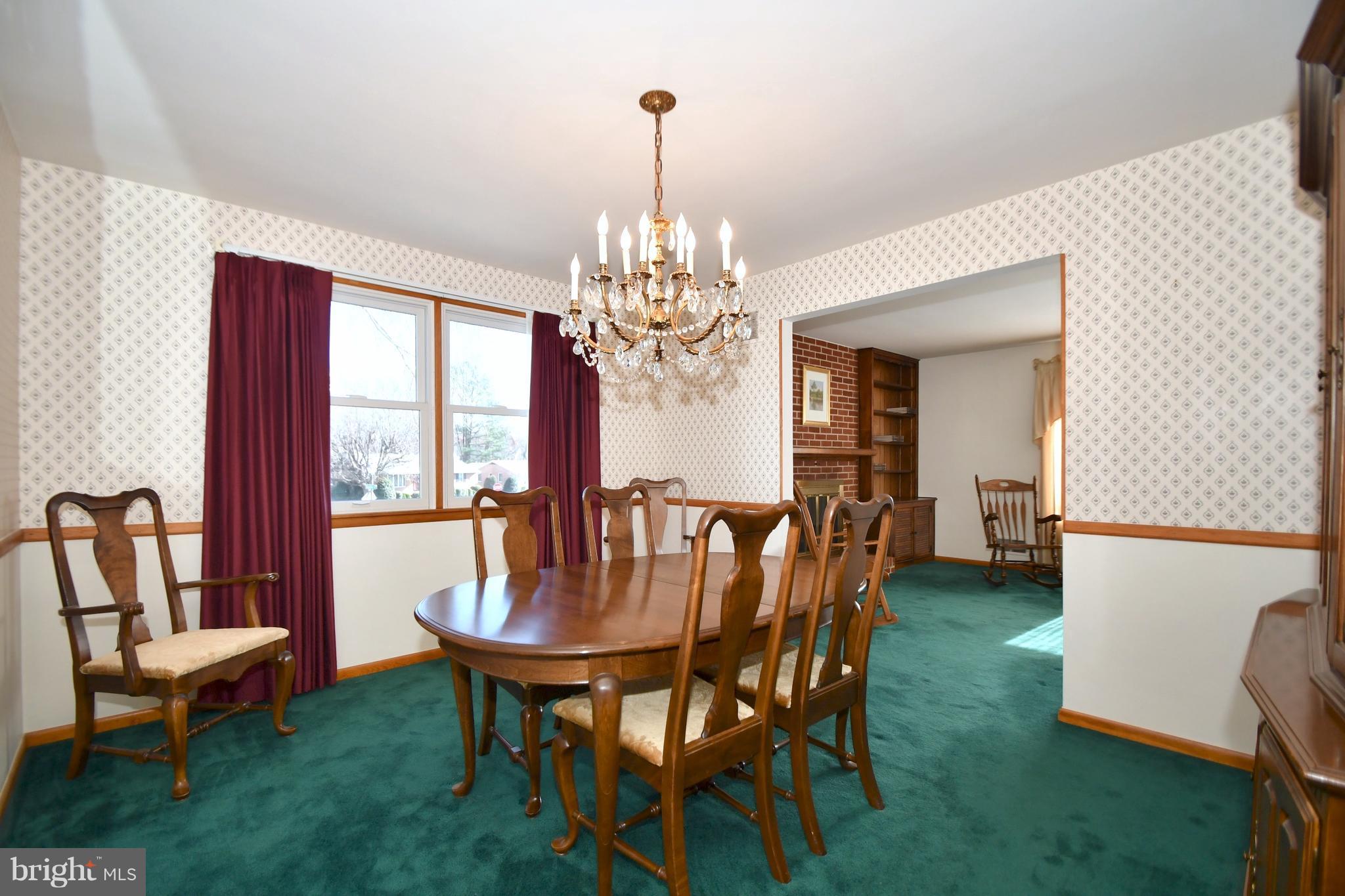 4314 Camellia Road Baltimore, MD 21236 - Photo 5 of 30 a view of a dining room with furniture and chandelier
