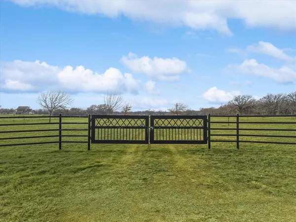 a view of a bench in a park