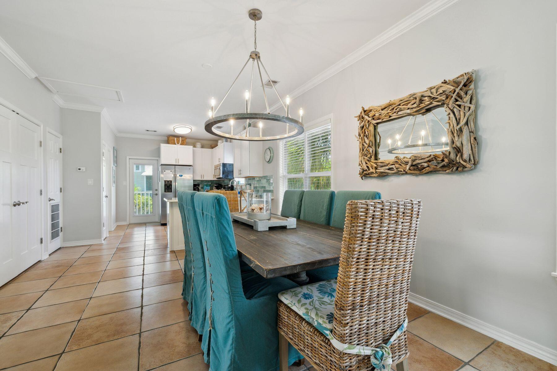 104 Emerald Dunes Circle Santa Rosa Beach, FL 32459 - Photo 11 of 53 a dining room with furniture and window