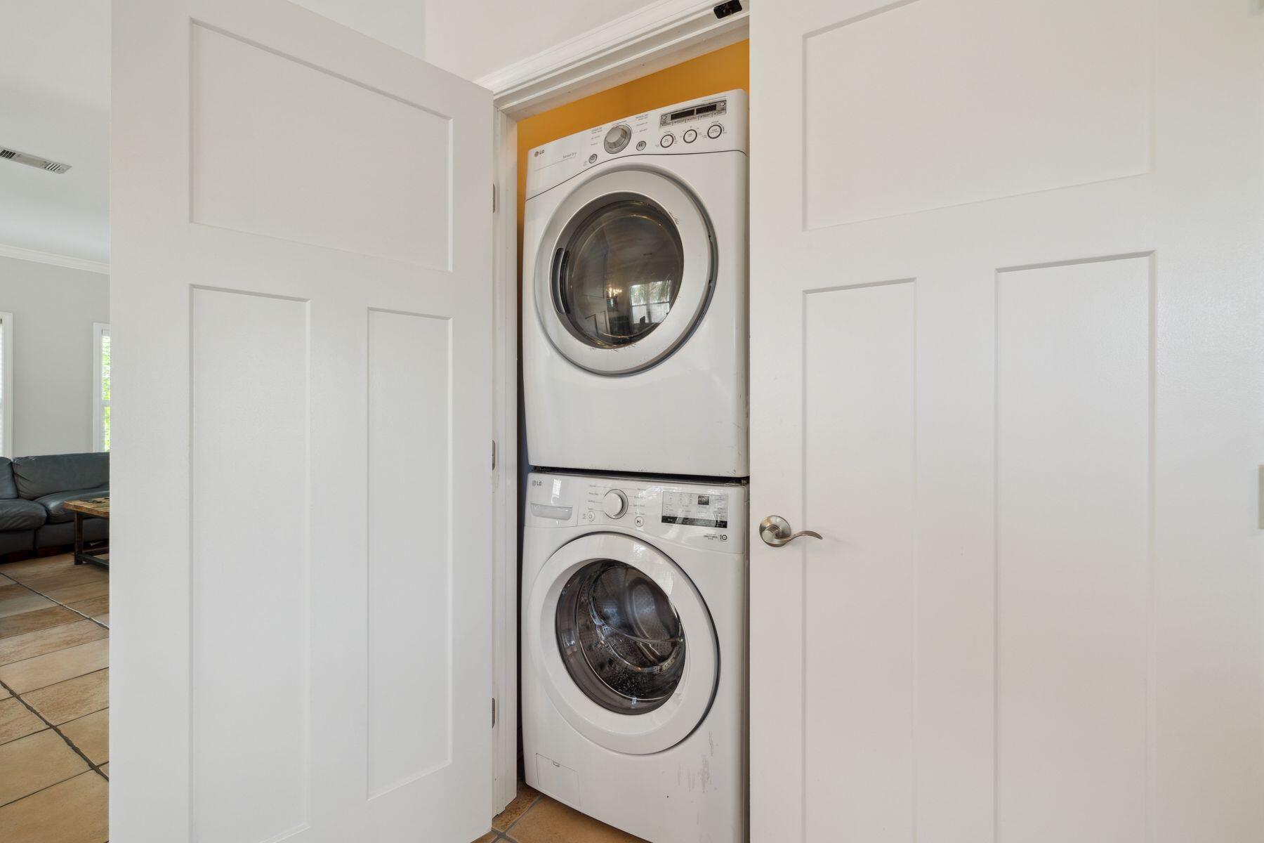 104 Emerald Dunes Circle Santa Rosa Beach, FL 32459 - Photo 36 of 53 a utility room with dryer and washer