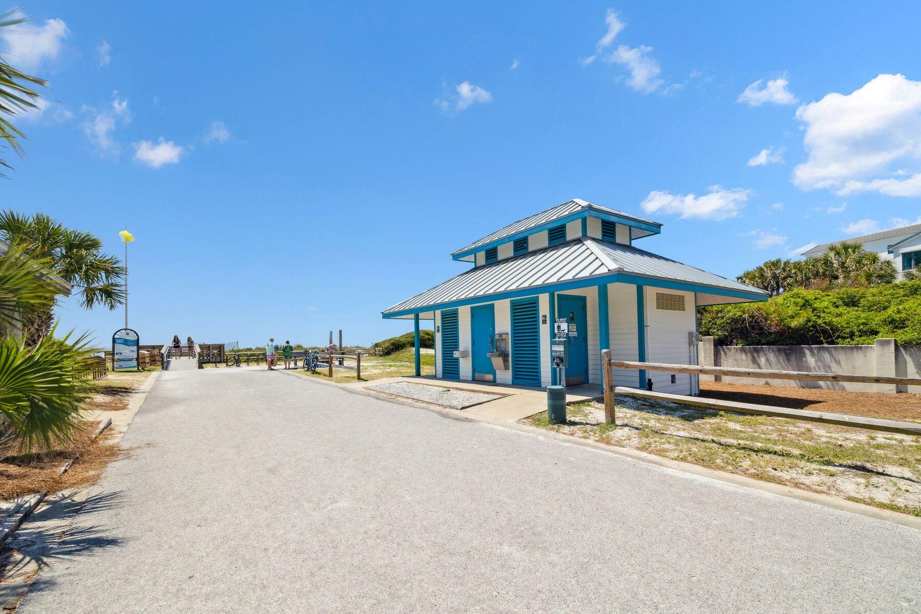 104 Emerald Dunes Circle Santa Rosa Beach, FL 32459 - Photo 45 of 53 a front view of a house with a yard