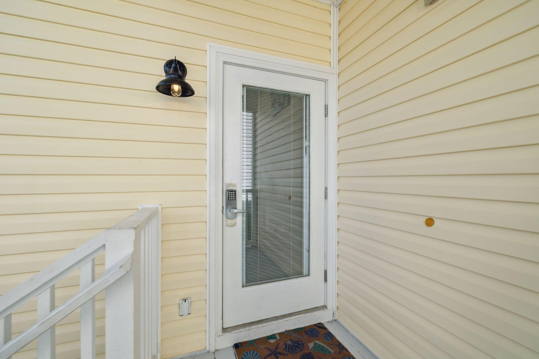 104 Emerald Dunes Circle Santa Rosa Beach, FL 32459 - Photo 6 of 53 a view of a door and a window