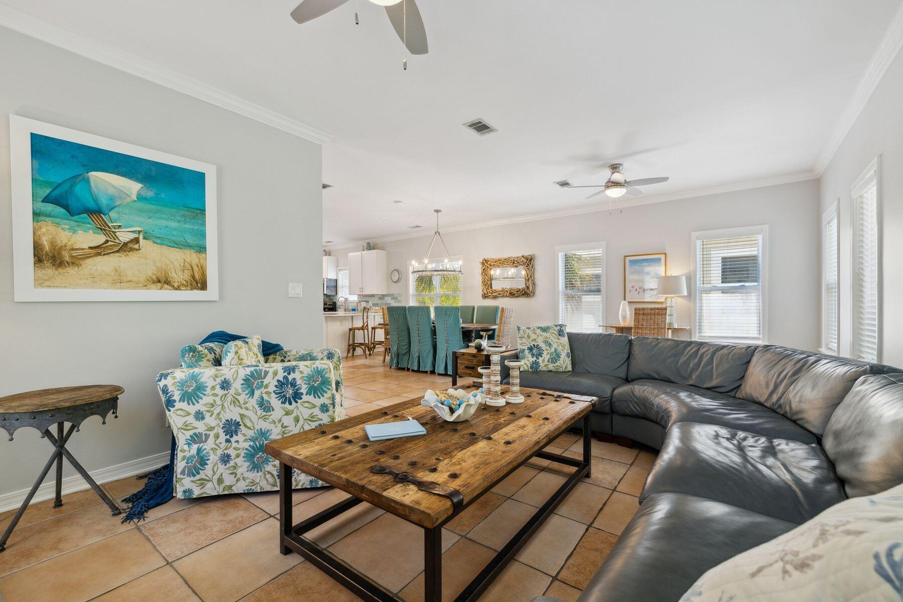 104 Emerald Dunes Circle Santa Rosa Beach, FL 32459 - Photo 8 of 53 a living room with furniture and wooden floor