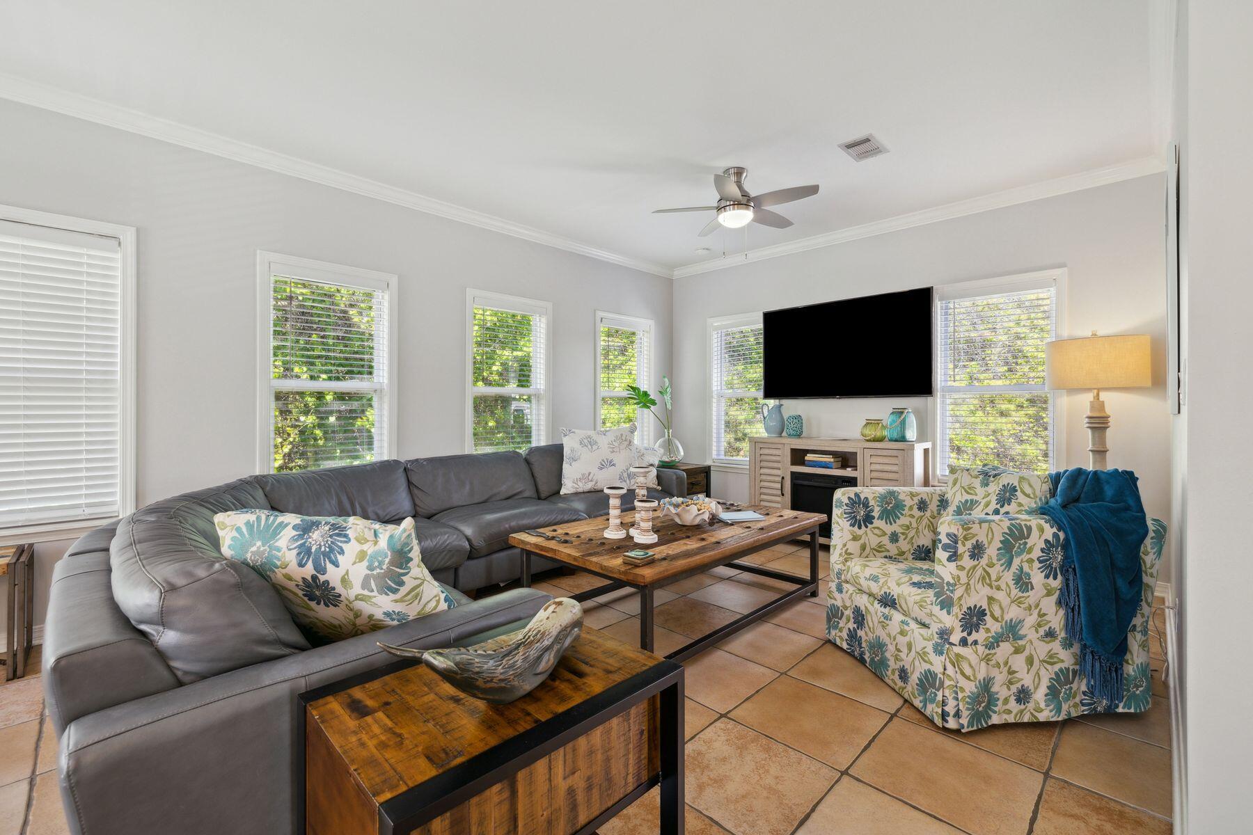 104 Emerald Dunes Circle Santa Rosa Beach, FL 32459 - Photo 9 of 53 a living room with furniture and a flat screen tv