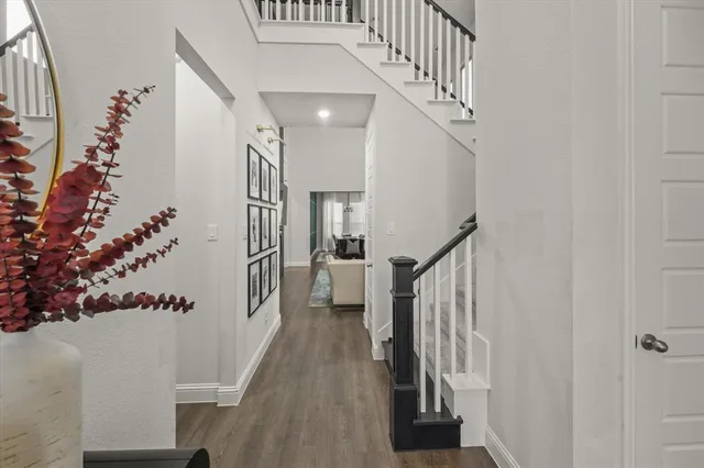 a view of entryway with wooden floor