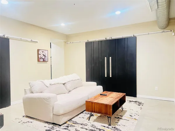 a living room with furniture