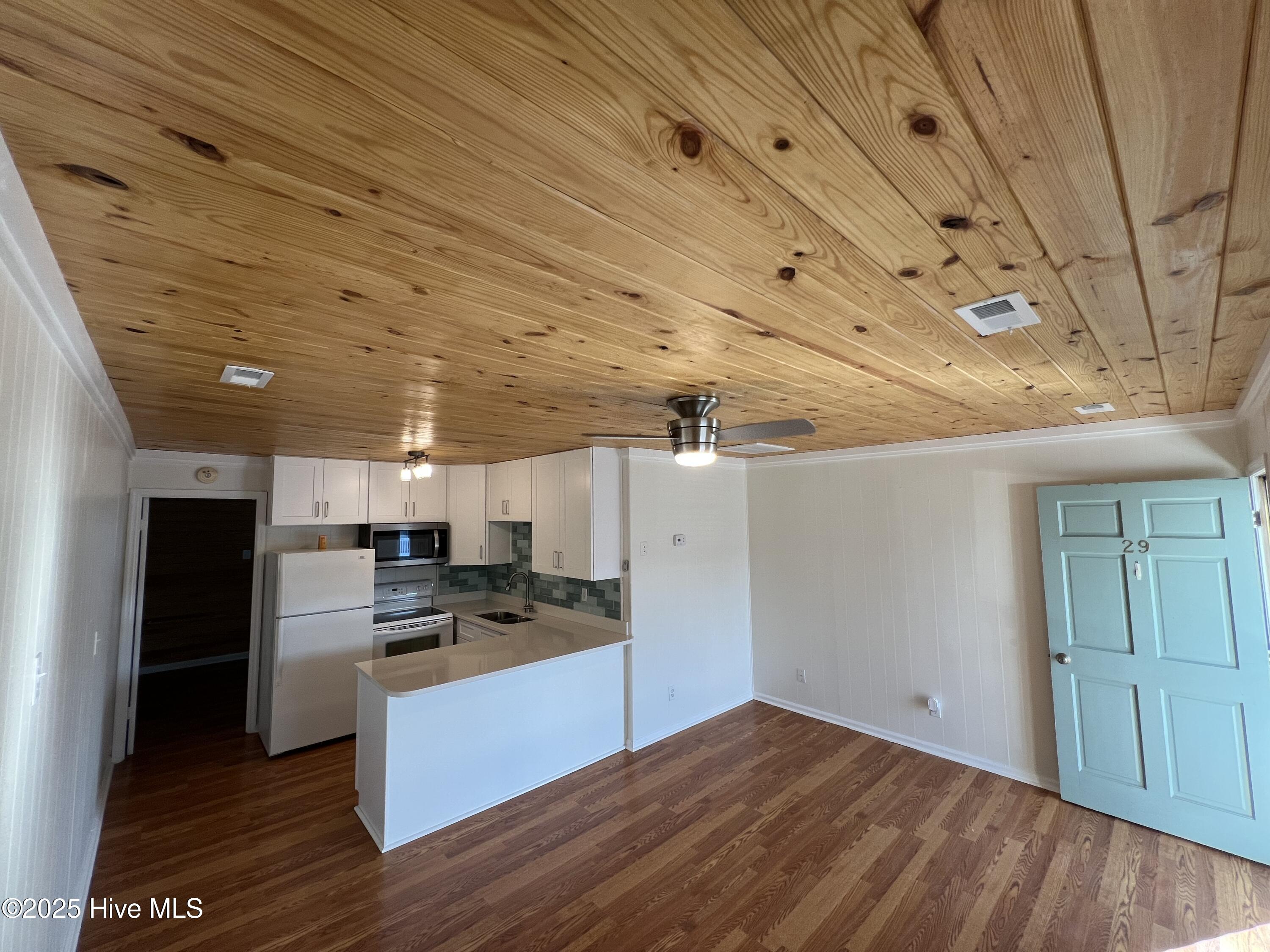 127 Old Causeway Road, Unit 29 Atlantic Beach, NC 28512 - Photo 5 of 15 Living To Kitchen