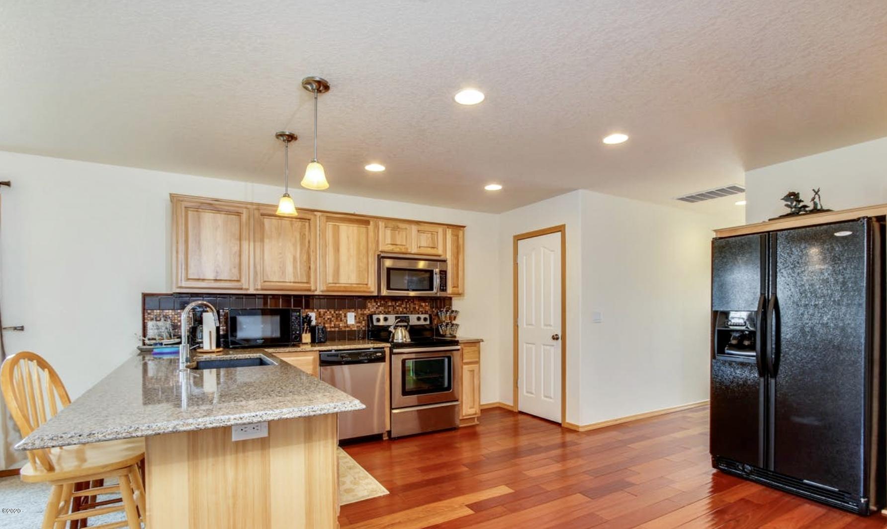 5777 Logan Road Lincoln City, OR 97367 - Photo 6 of 30 Spacious Kitchen with Pantry