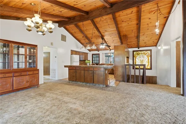 a view of room with window and ceiling fan