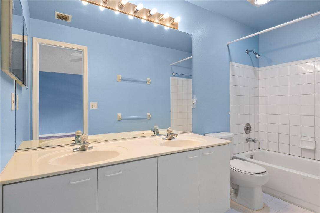 11030 Palm Ridge Lane, Unit 17 Tamarac, FL 33321 - Photo 22 of 32 One of two master bathrooms