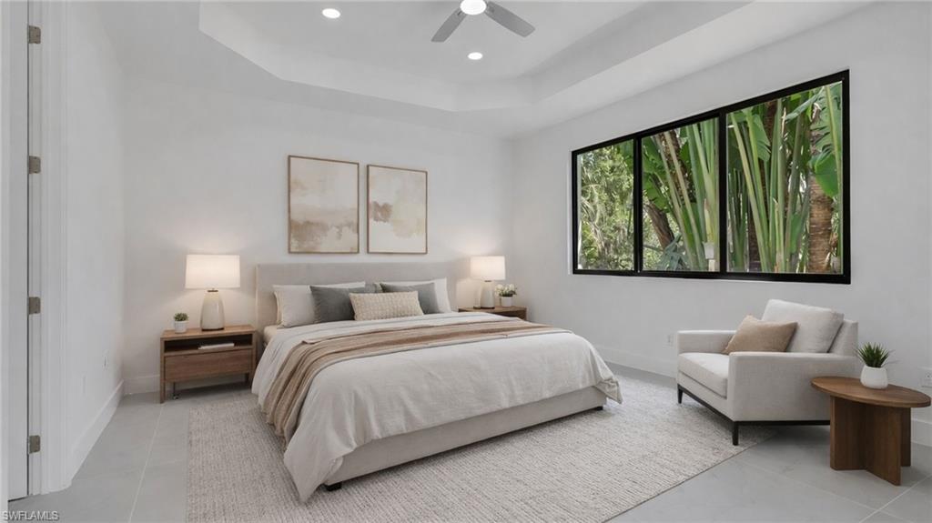 730 29th Street Southwest Naples, FL 34117 - Photo 12 of 50 Virtually Staged Bedroom with a tray ceiling, a ceiling fan, and recessed lighting