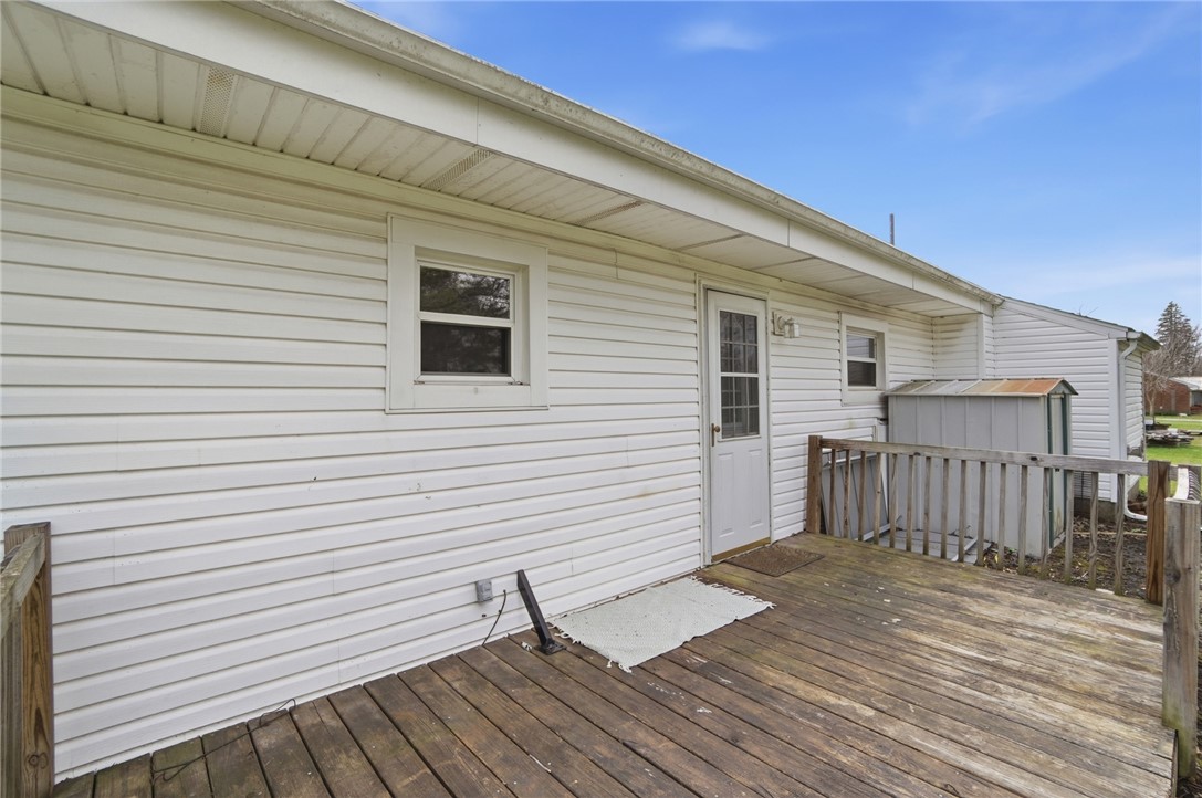 1166 West Sparrow Road Springfield, OH 45502 - Photo 36 of 40 This house features a wooden deck, perfect for enjoying the outdoors.