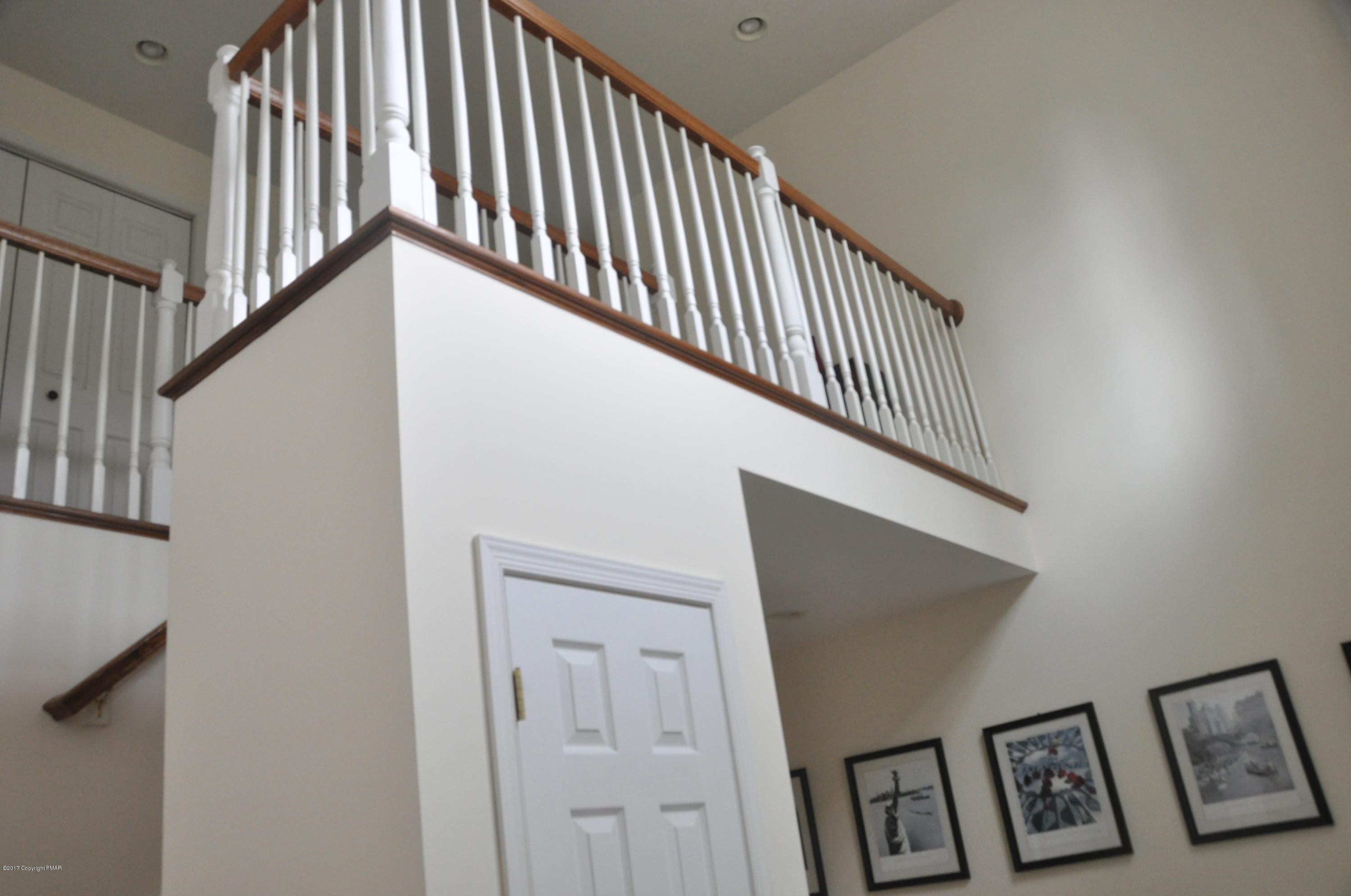 167 Sawmill Road Long Pond, PA 18334 - Photo 15 of 38 a view of staircase with railing and white walls