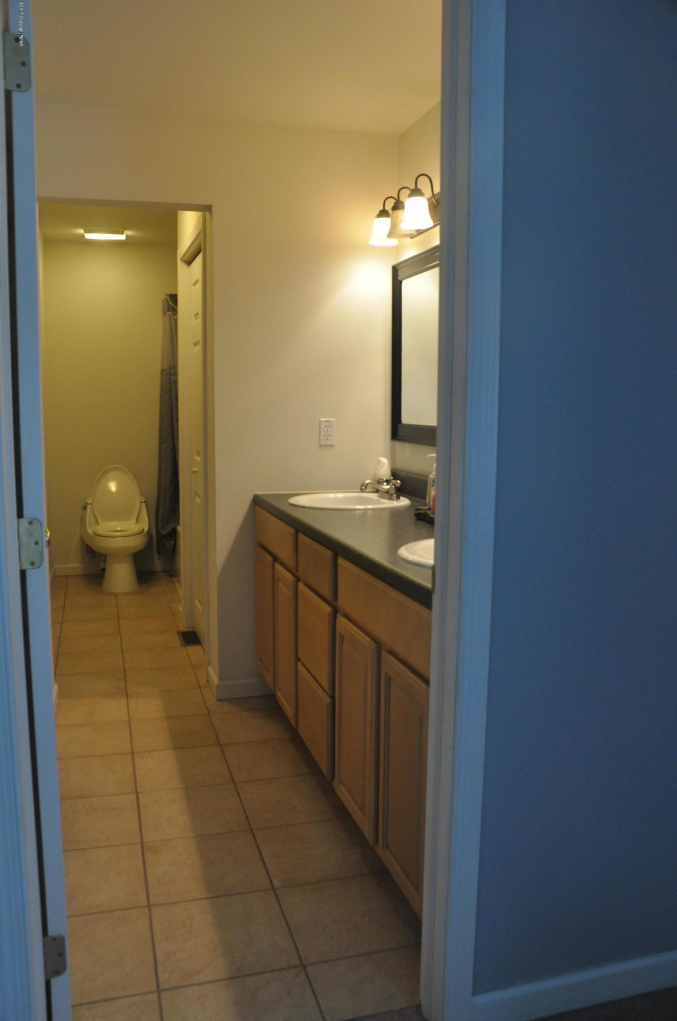 167 Sawmill Road Long Pond, PA 18334 - Photo 24 of 38 a spacious bathroom with a mirror sink and toilet
