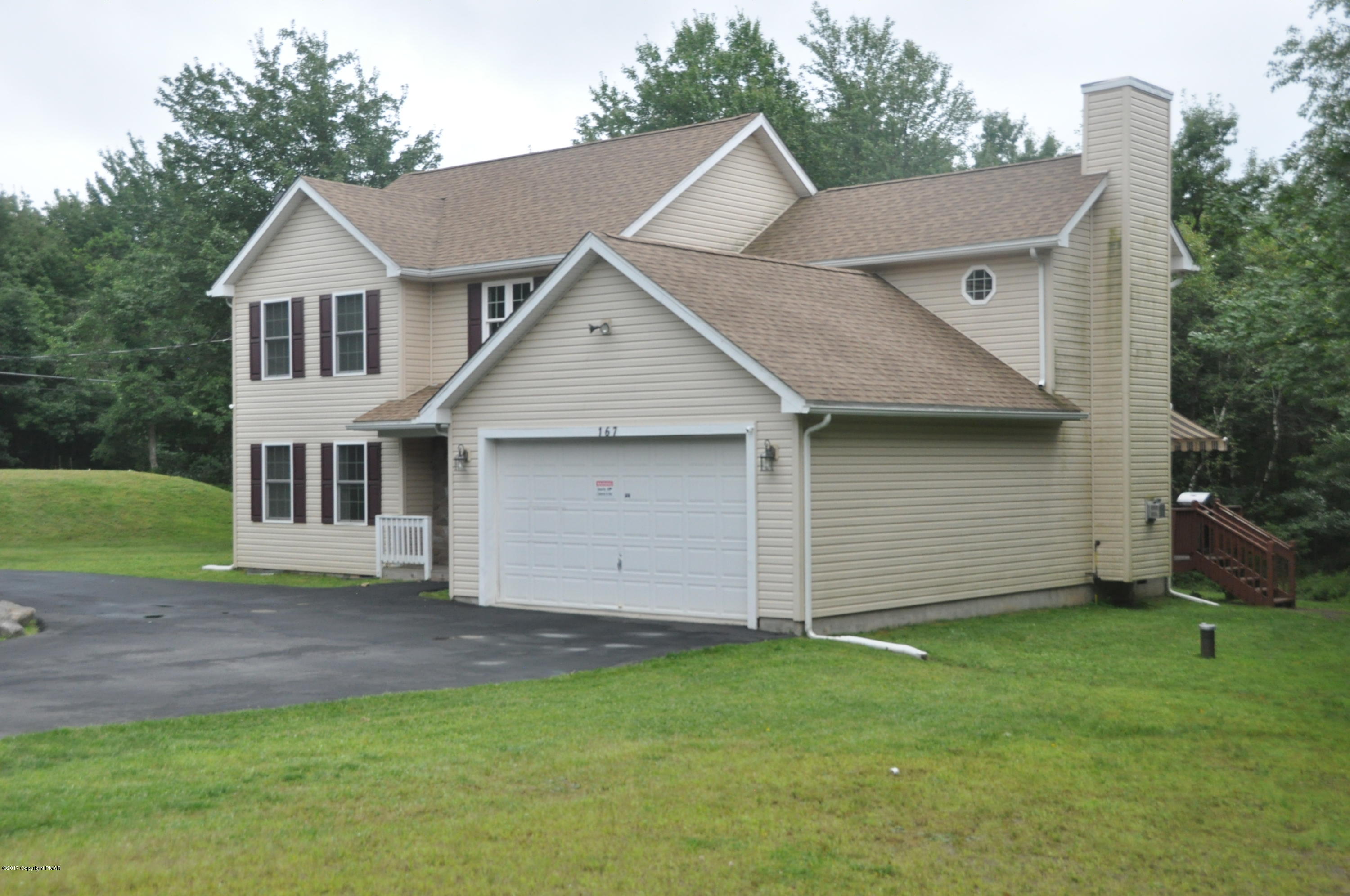167 Sawmill Road Long Pond, PA 18334 - Photo 3 of 38 a view of a house with a yard