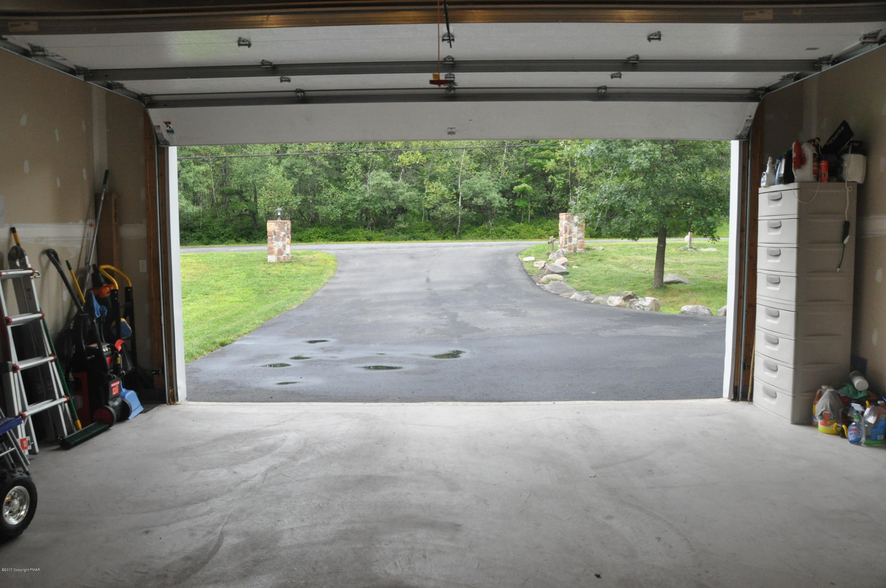 167 Sawmill Road Long Pond, PA 18334 - Photo 31 of 38 a view of a porch with wooden floor and roof